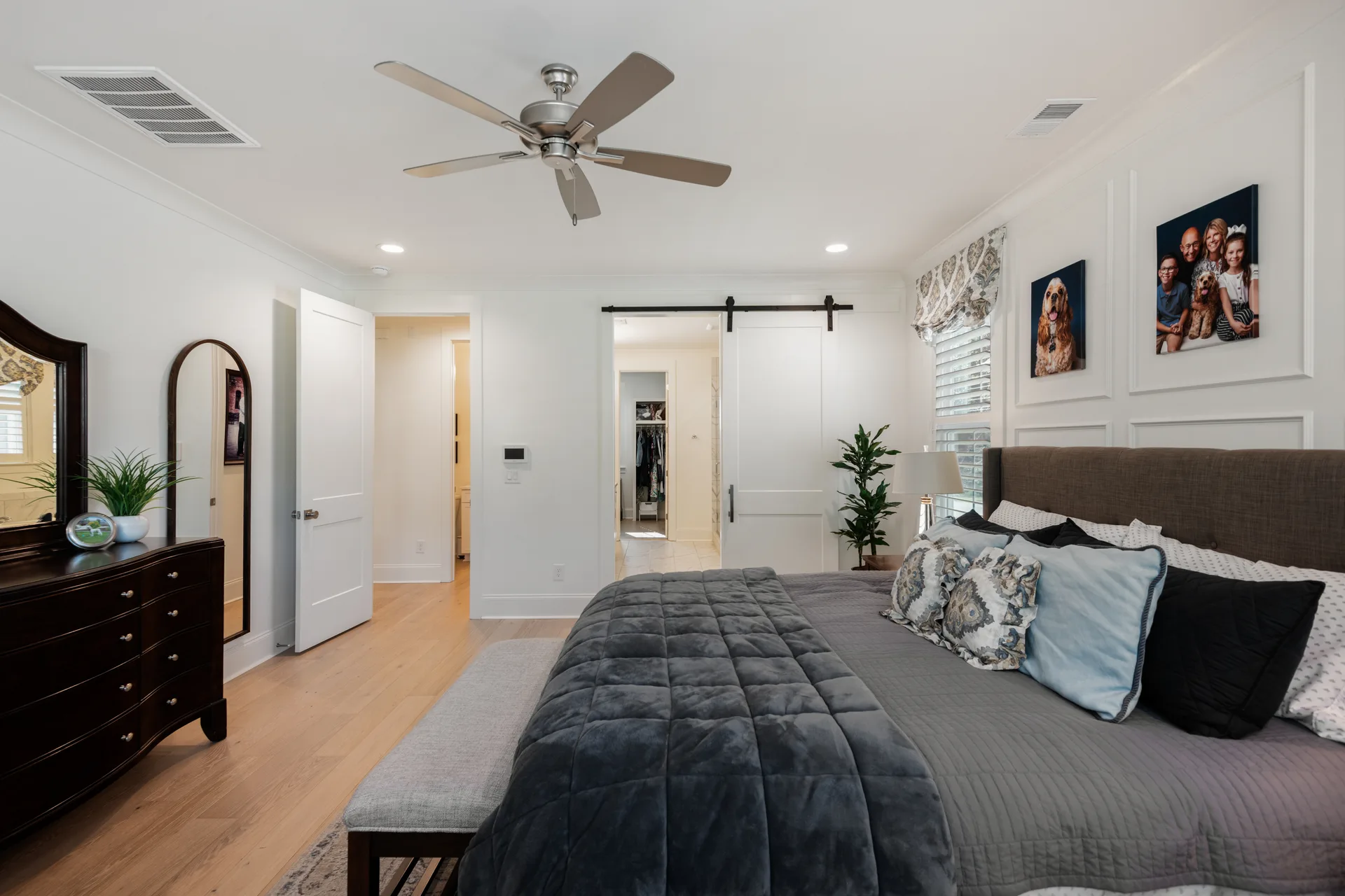 Suite with barn door to bath and closet