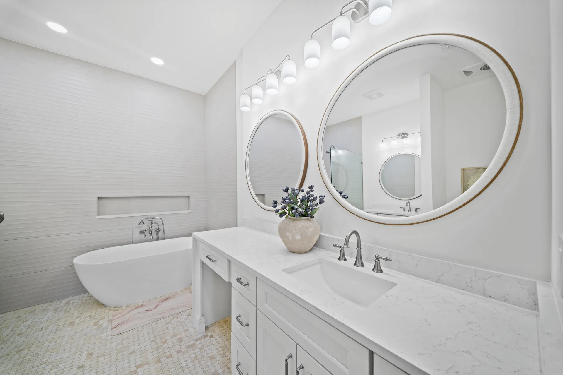 Renovated primary bathroom with soaking tub at 878 Vistana Circle Naples FL