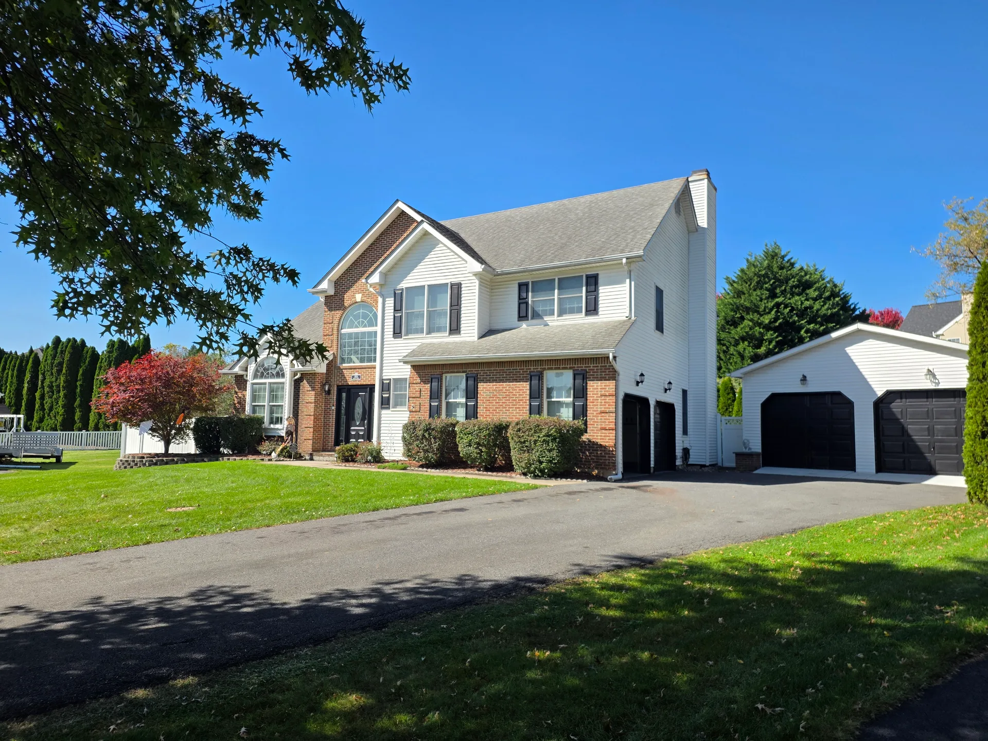 Colonial facade with attached garage at 1906 Grouse Court, Forks Township PA