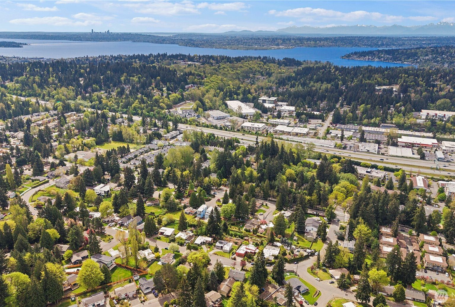 Aerial view of Rose Hill neighborhood with Lake Washington and Cascades in background