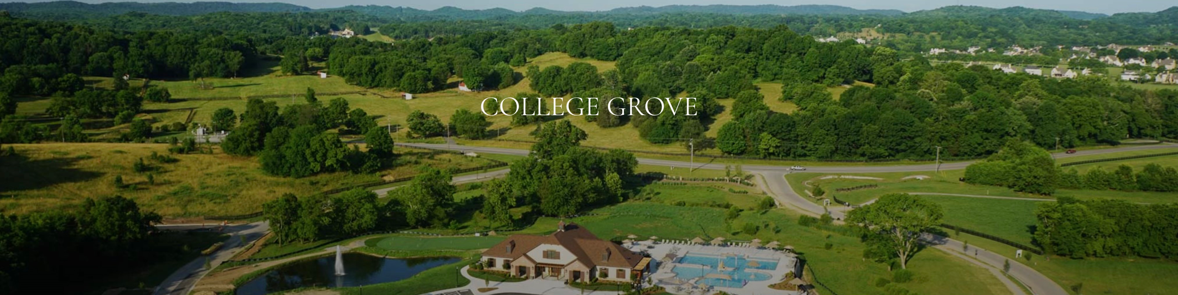 Panoramic aerial drone shot of a luxury community clubhouse with a pool in College Grove