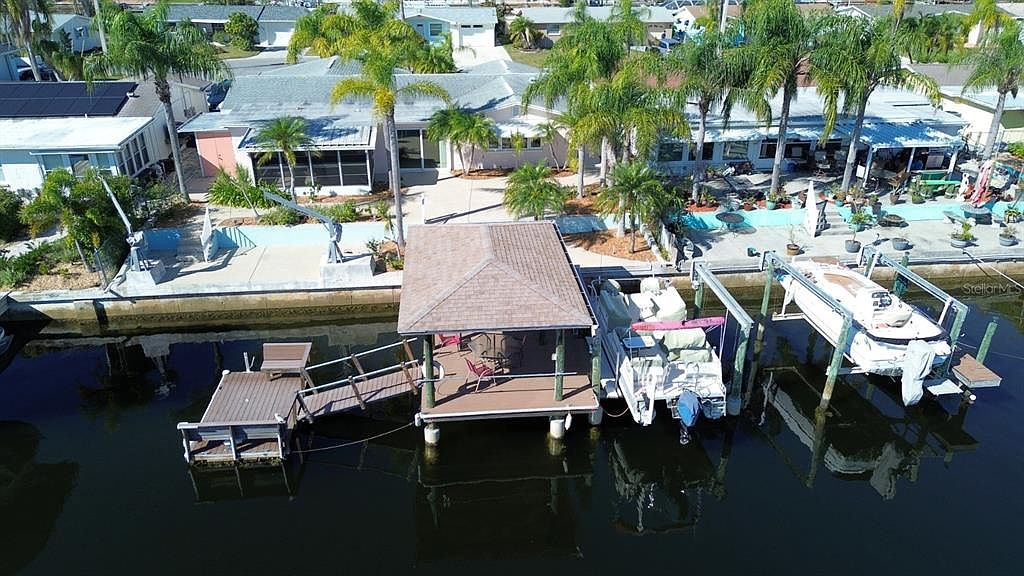 Aerial view of 12612 4th Isle waterfront dock and canal