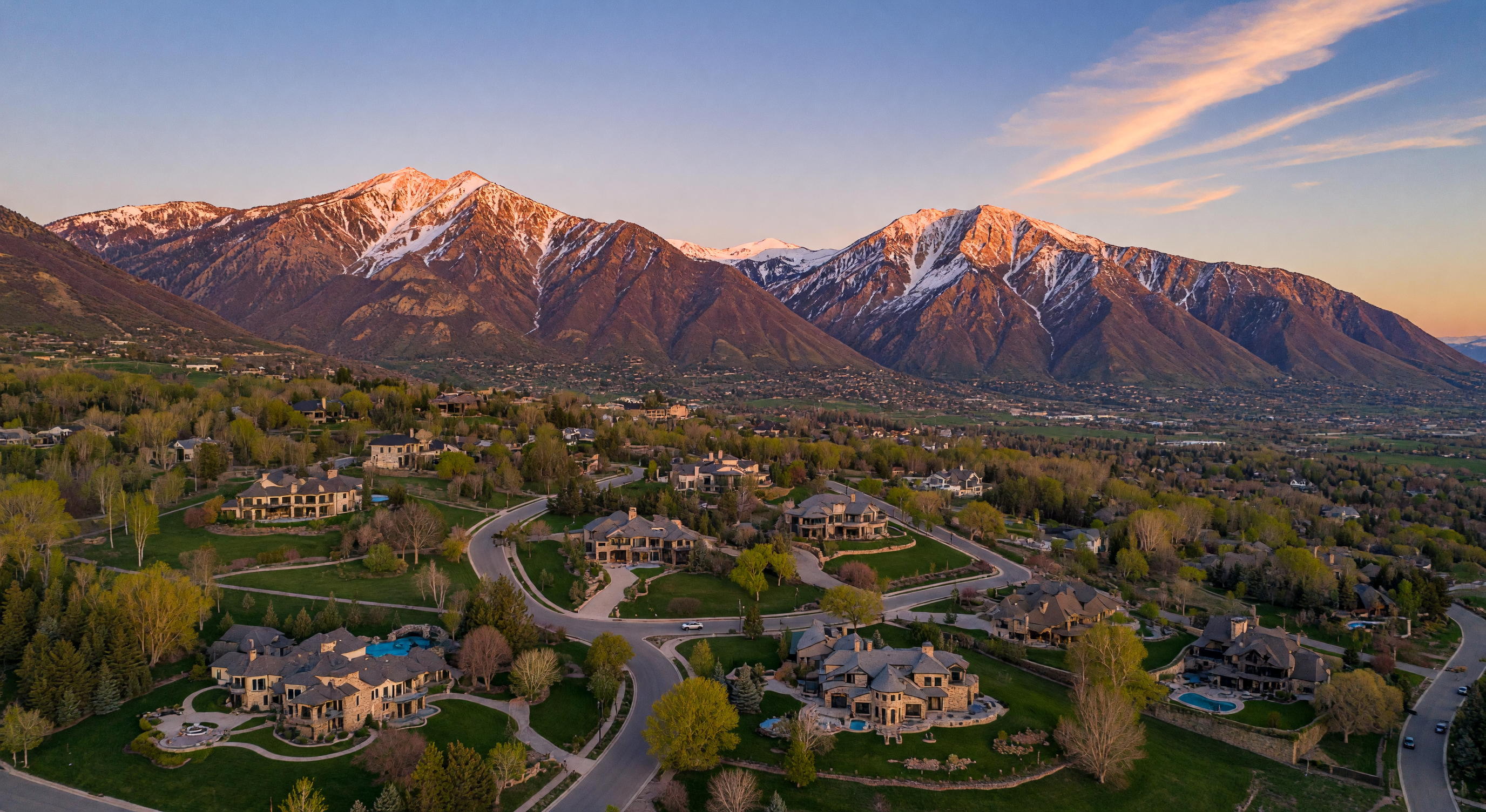 Alpine, Utah — luxury homes and custom estates with the Wasatch Mountains at golden hour