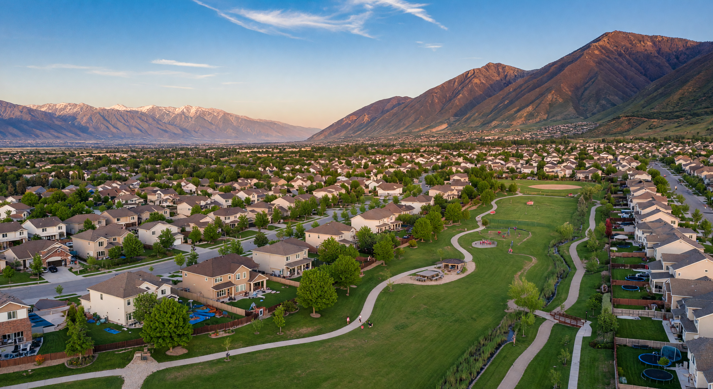 Riverton, Utah — suburban homes with mountain views along tree-lined streets