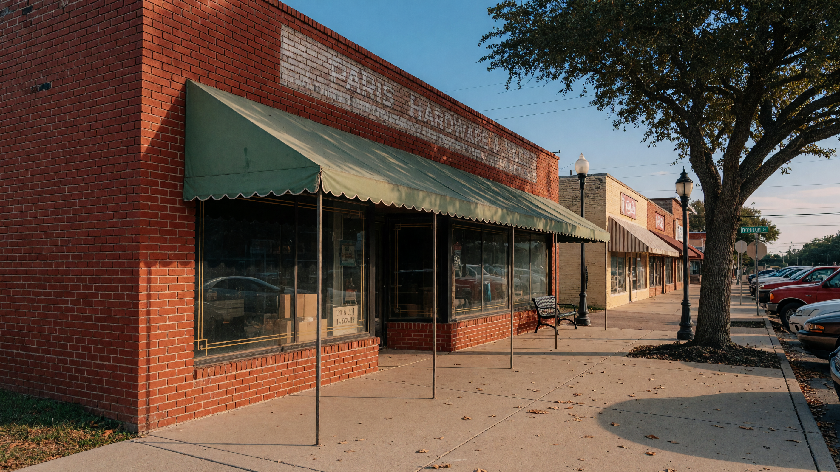 Commercial property at 1905 E Price Street in Paris, Texas showing a spacious building on a large lot with street frontage