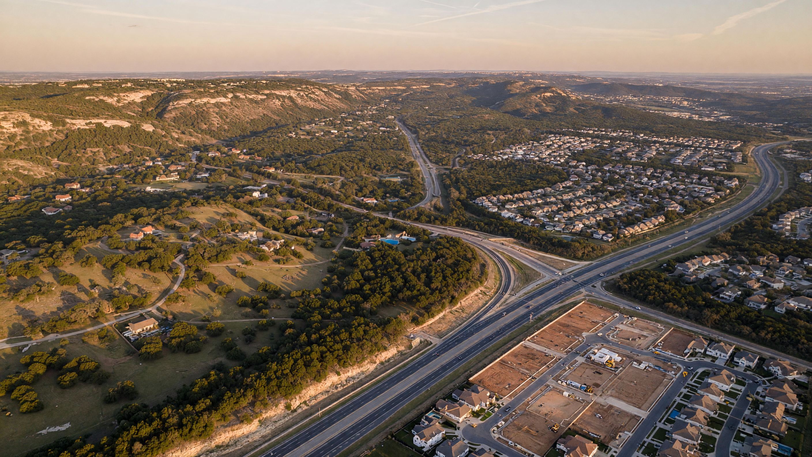 San Antonio northwest corridor with Hill Country terrain transitioning to suburban neighborhoods