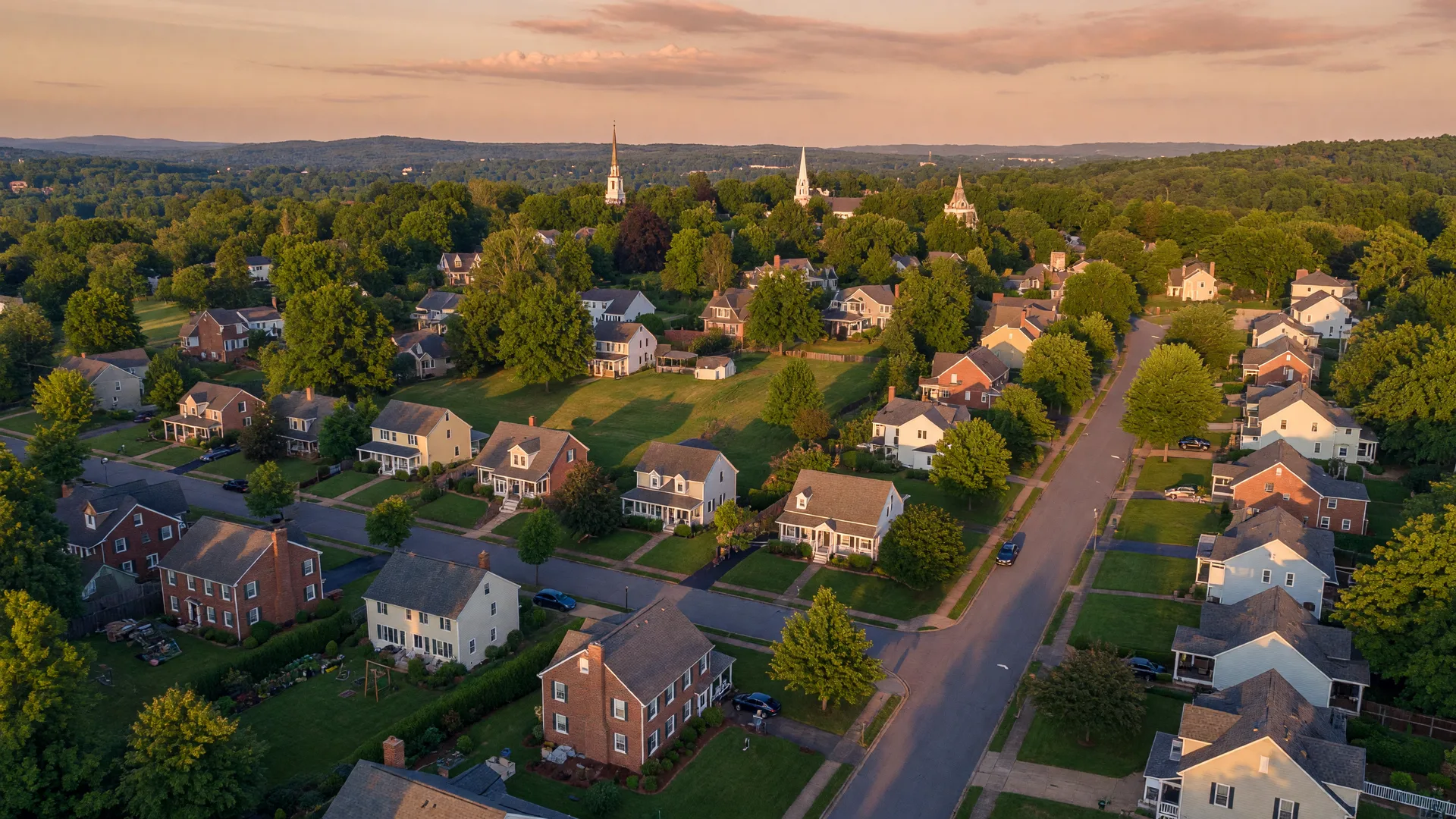 Tree-lined suburban neighborhood in the Richmond Virginia area at golden hour