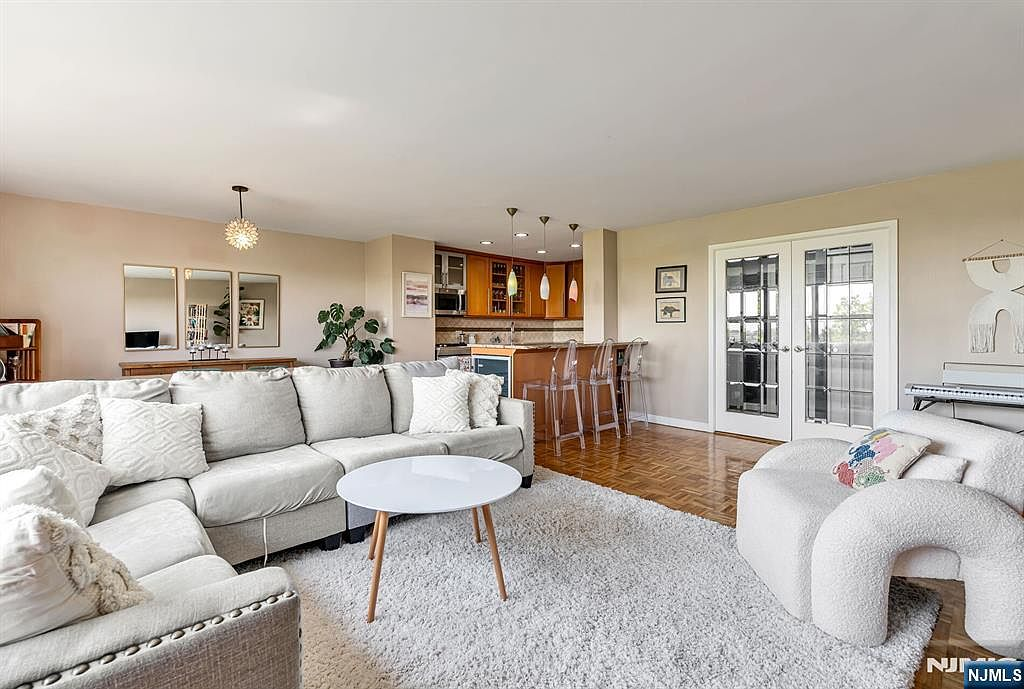 Living room open floor plan facing kitchen