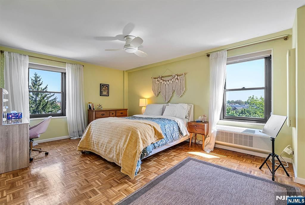 Bedroom with parquet flooring