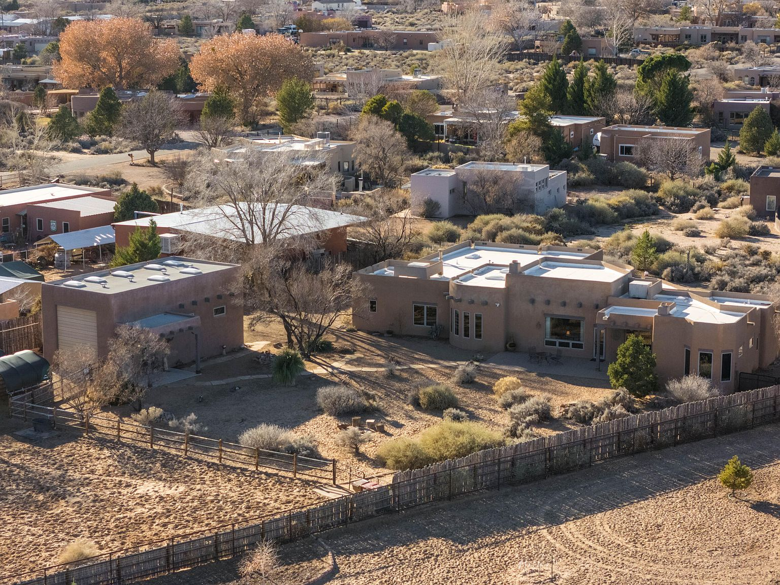 Aerial view of the Pueblo-style estate with detached workshop