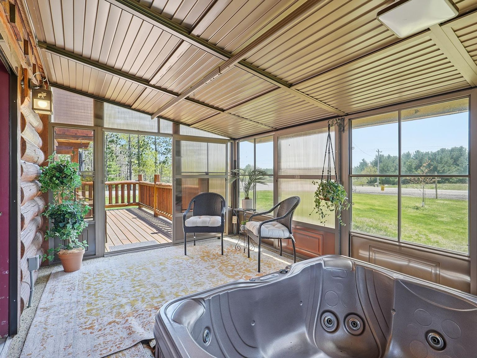 Screened porch with access to the deck