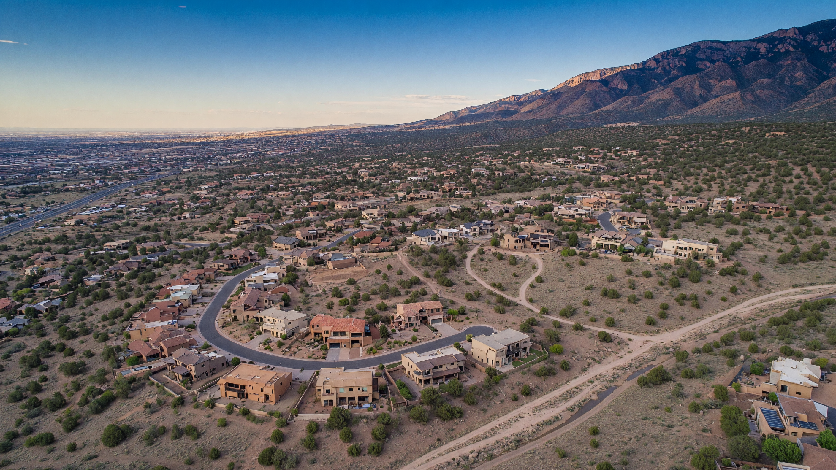 Aerial view of Sandia Heights, NM with Sandia Mountain foothills