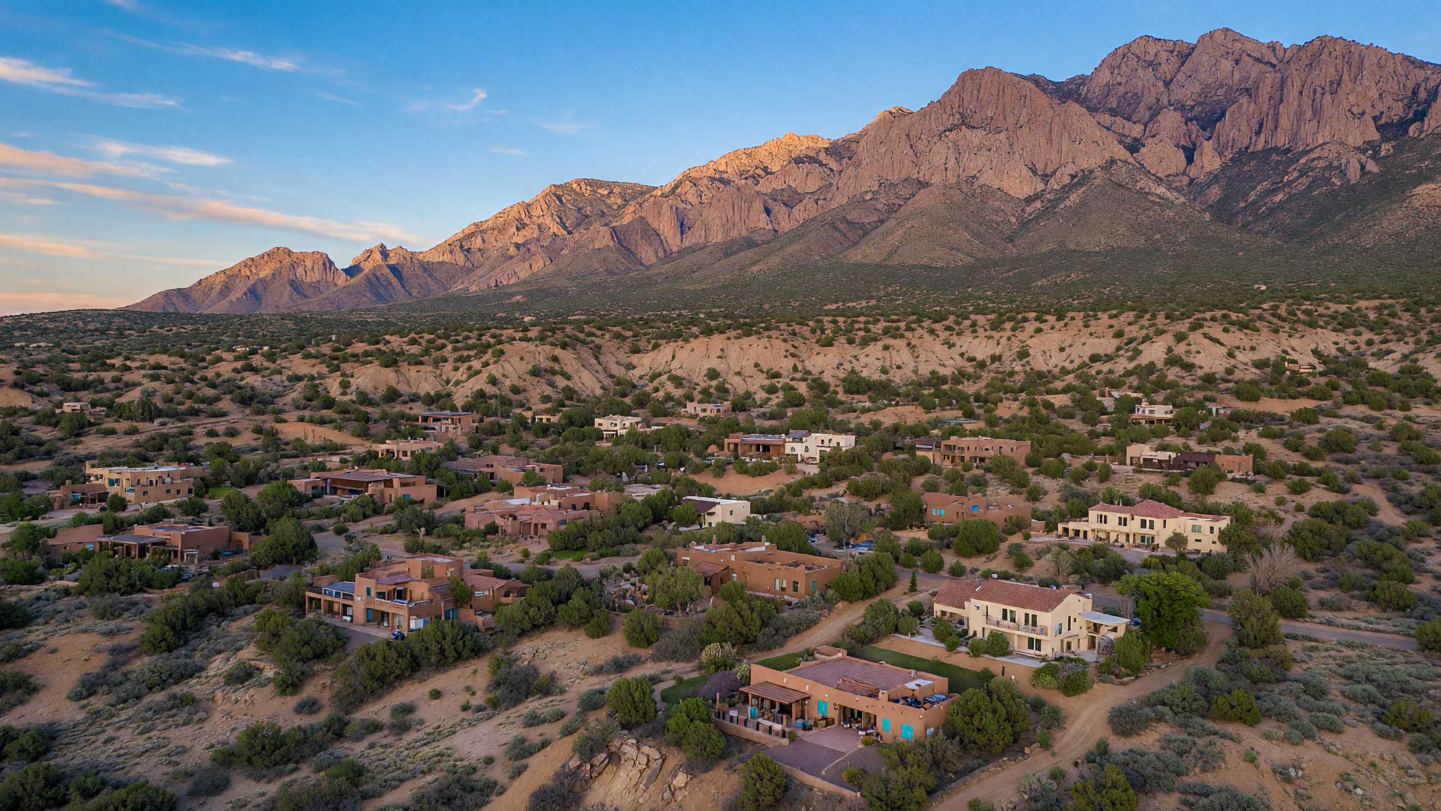 Aerial view of Placitas, NM with desert foothills and Sandia Mountains