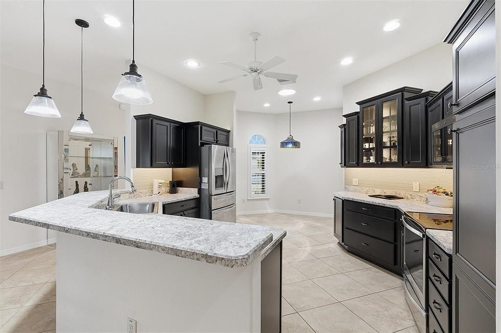 Kitchen breakfast bar with pendant lighting