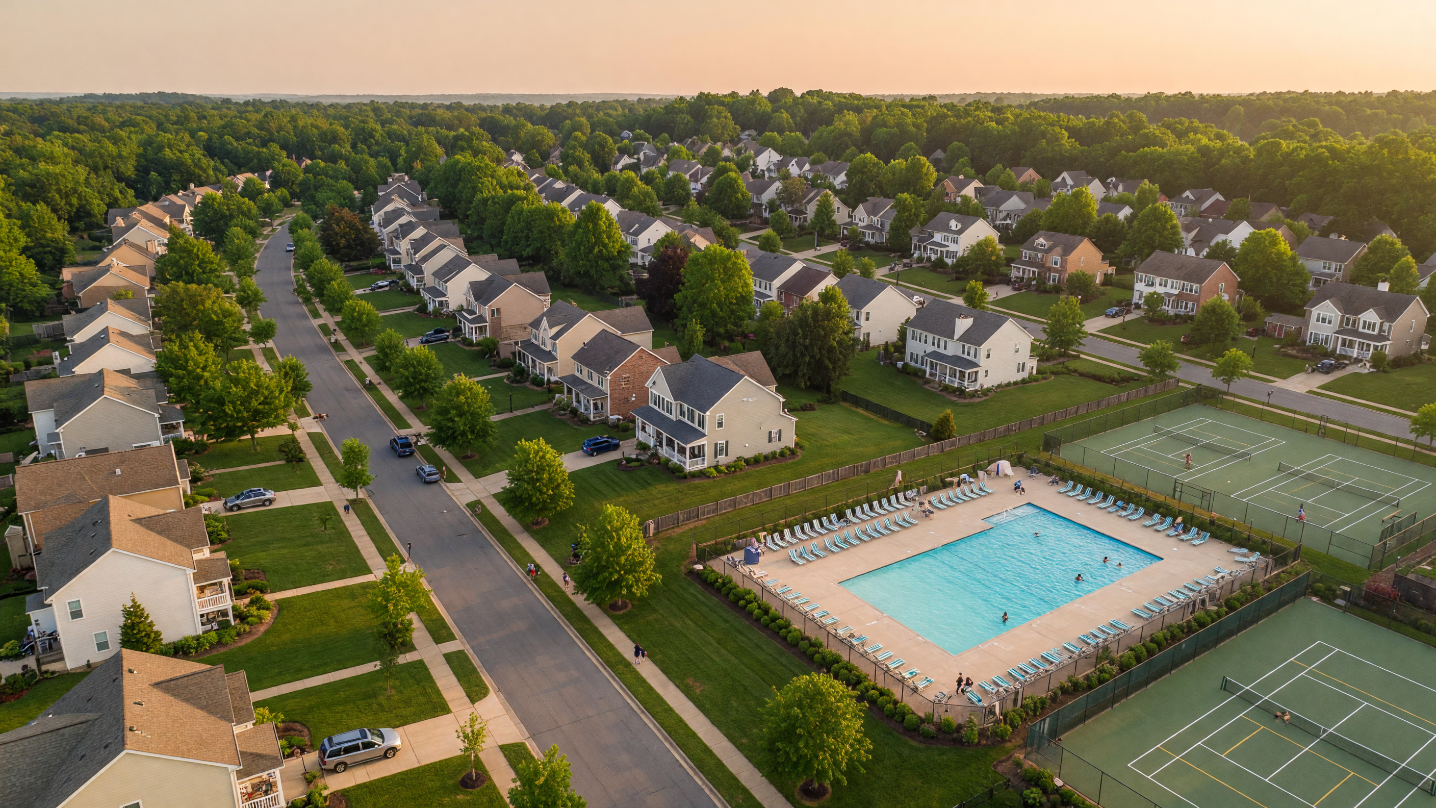 Hampton Oaks master-planned community in Stafford Virginia — tree-lined residential streets, community pool, and well-established homes