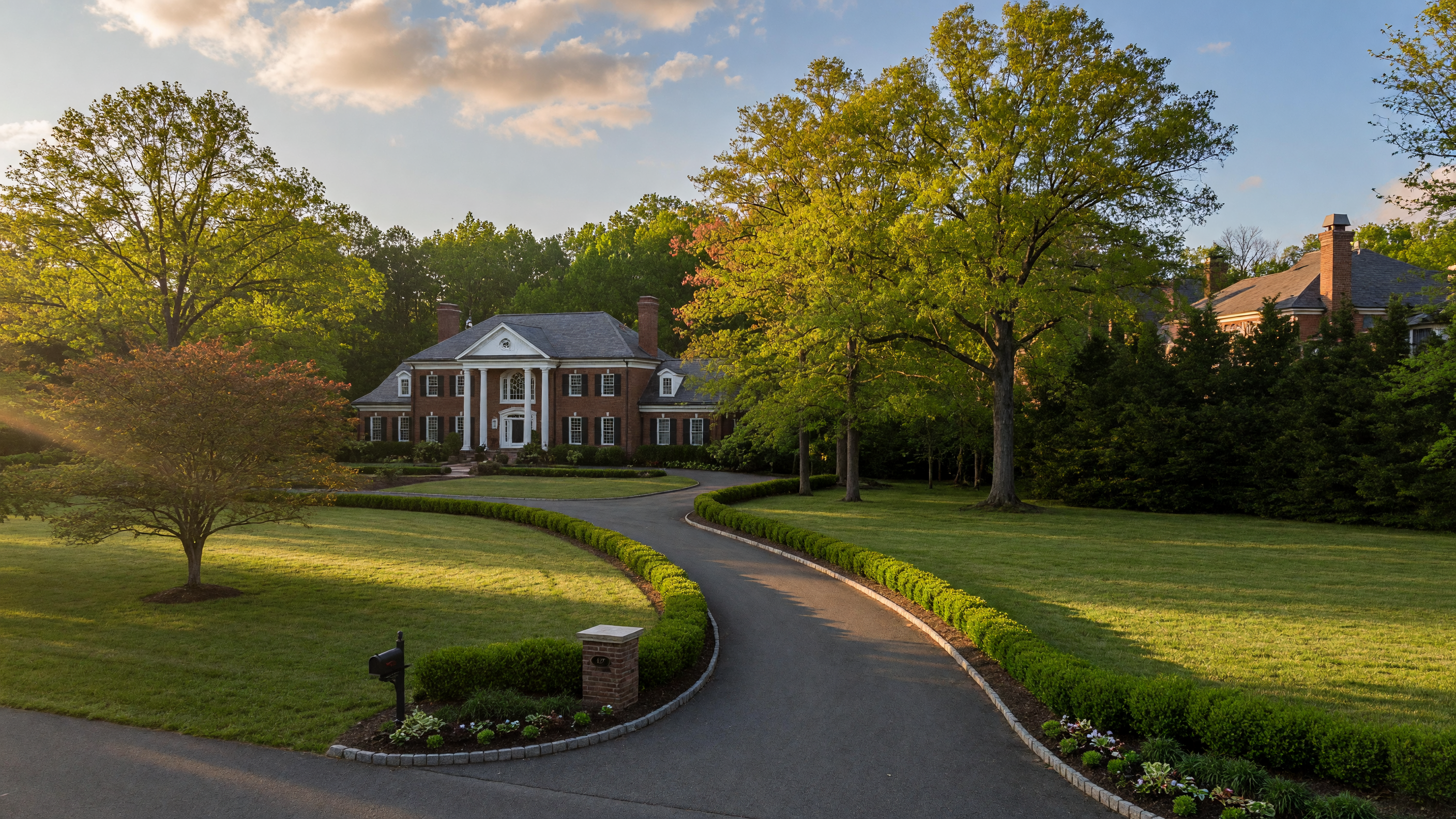 The Glens upscale estate neighborhood in Stafford Virginia — custom luxury home on a sprawling wooded lot with mature trees and a long private driveway