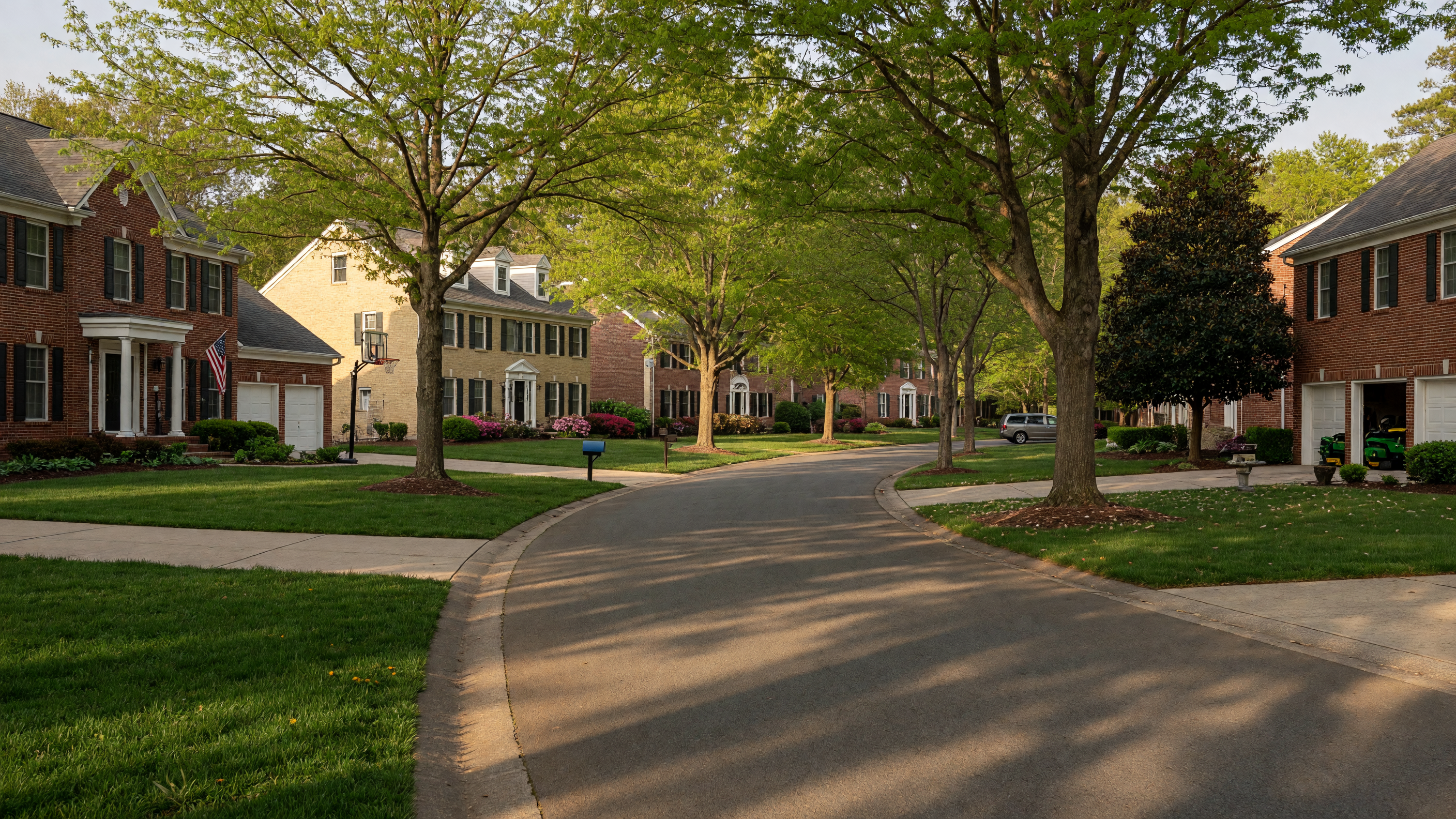 Liberty Knolls upscale neighborhood in Stafford Virginia — colonial-style homes with brick fronts on tree-lined streets