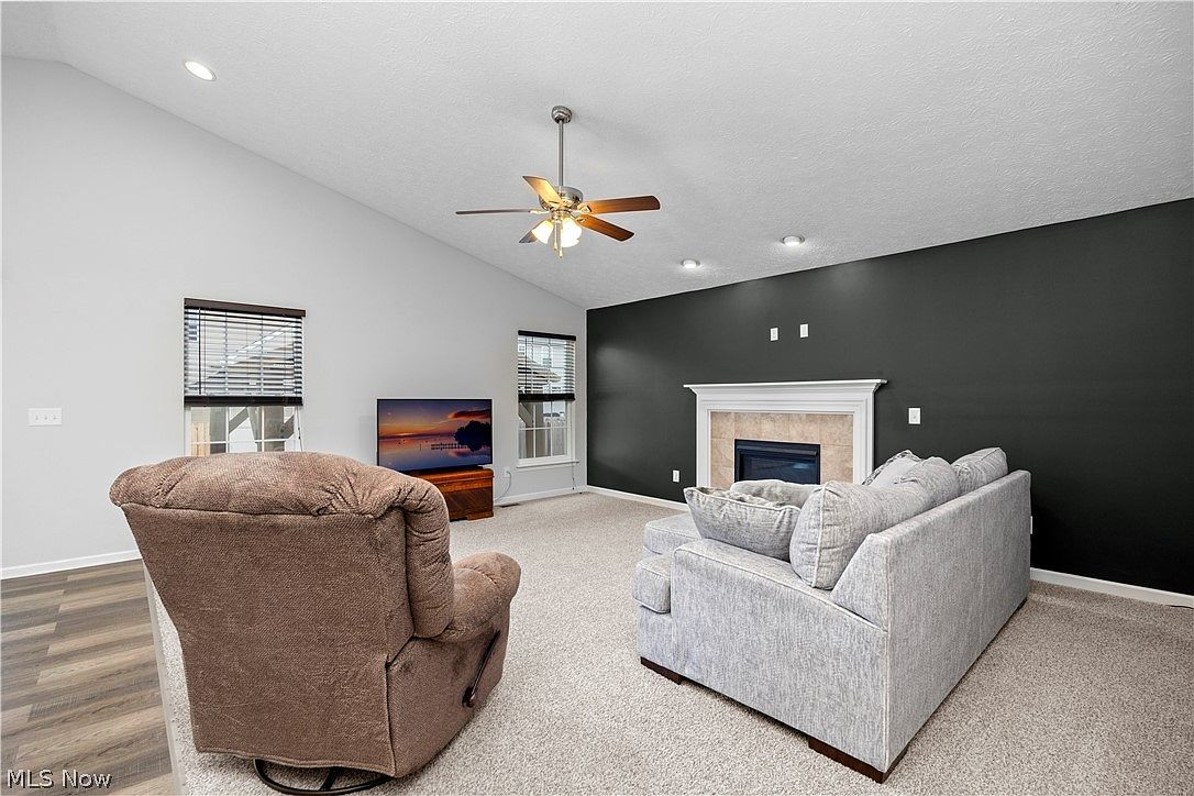 Living room with fireplace accent wall