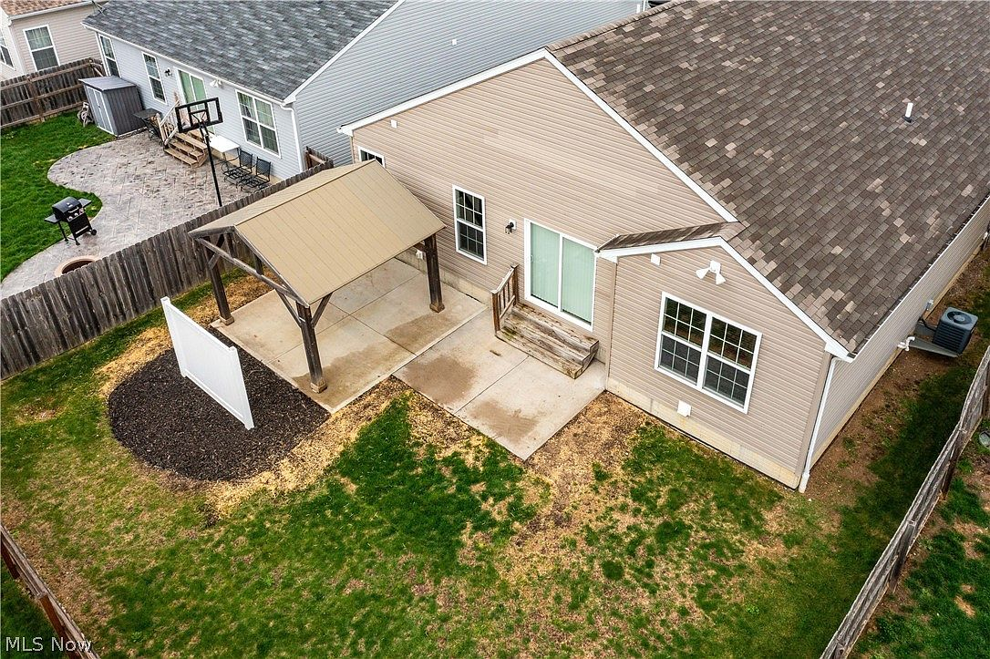 Aerial view of backyard patio and pergola