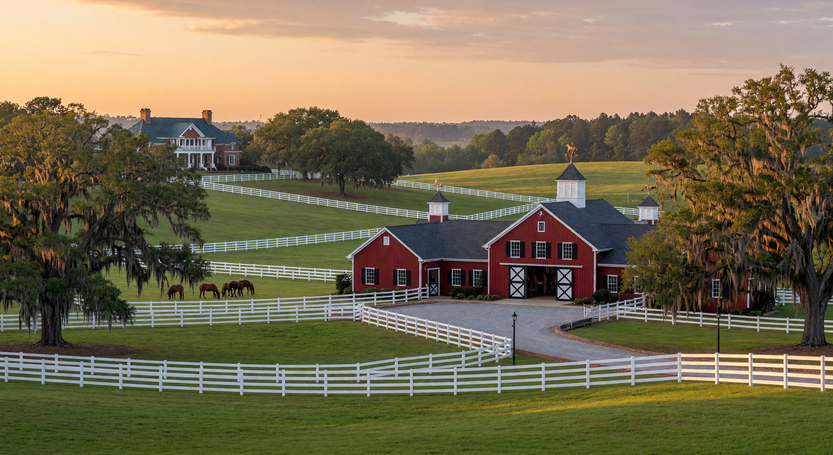 Luxury equestrian estate in Aiken SC with white fencing and live oaks
