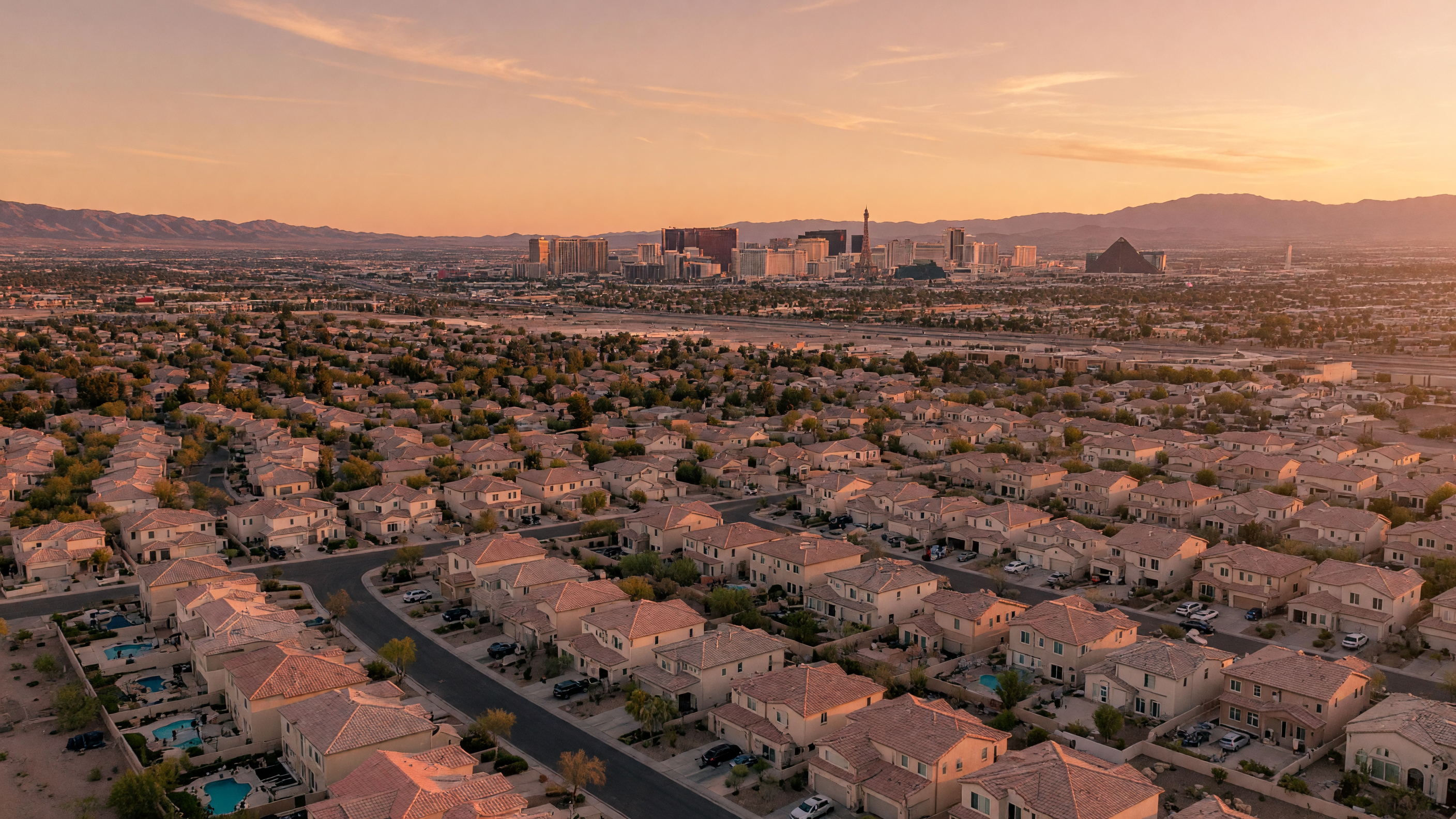 Las Vegas skyline with residential neighborhoods and the Strip at golden hour