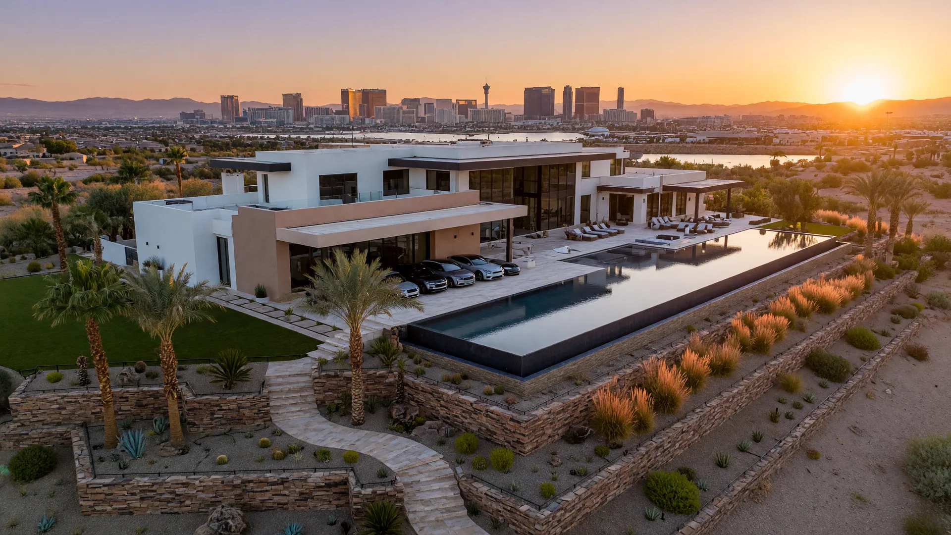 Luxury desert estate in Henderson NV overlooking the Las Vegas valley at golden hour with infinity pool