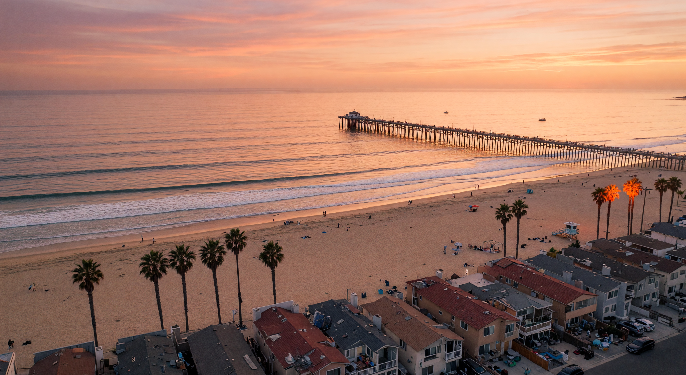 Imperial Beach coastline at golden hour with the pier in the distance