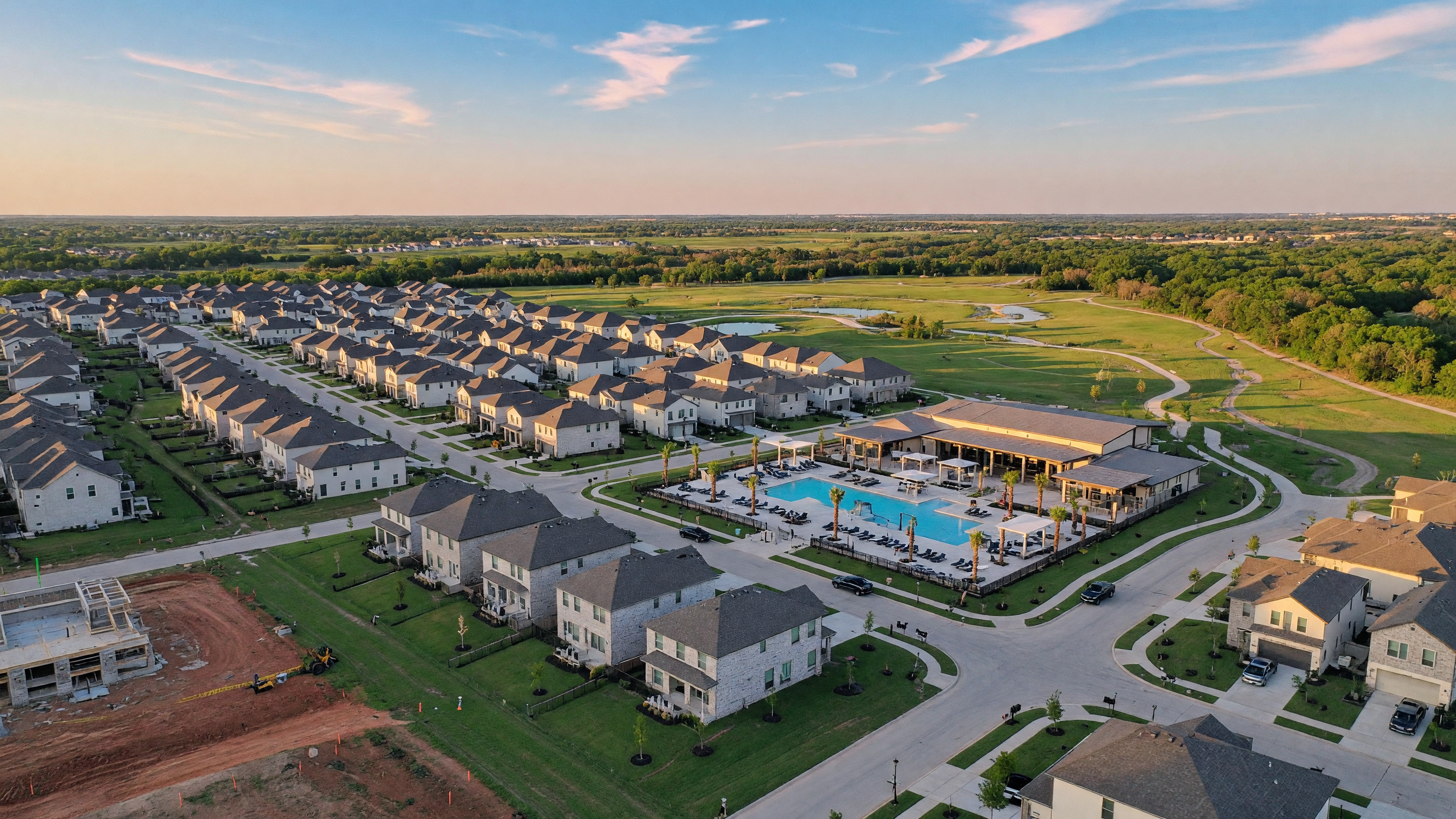 Aerial view of the Dallas-Fort Worth metroplex and North Texas communities at golden hour