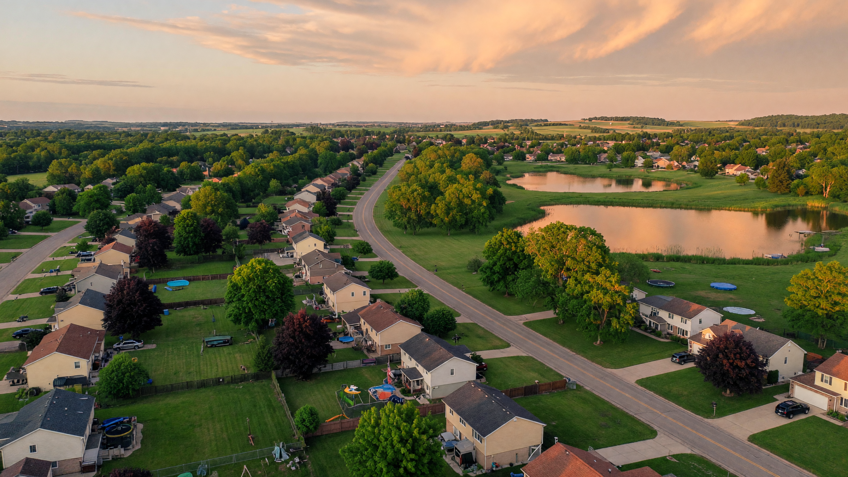 Aerial view of Genesee County Michigan suburban neighborhoods and tree-lined streets