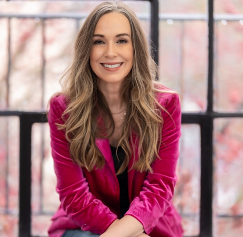 Dawn Cordiner, real estate agent, wearing a magenta blazer