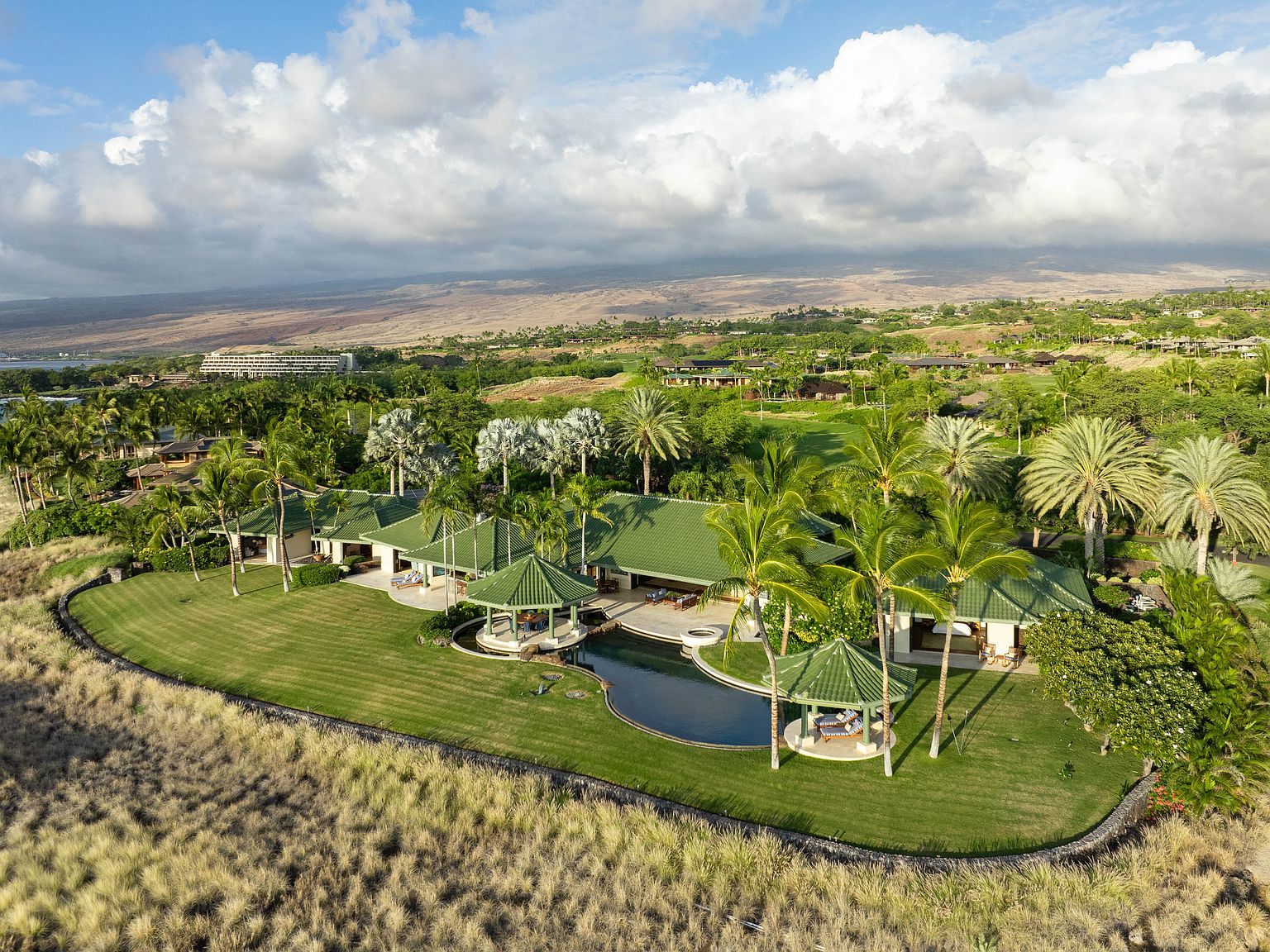 Aerial view of Hale Kiekiena estate with infinity pool and tropical grounds at Mauna Kea Resort