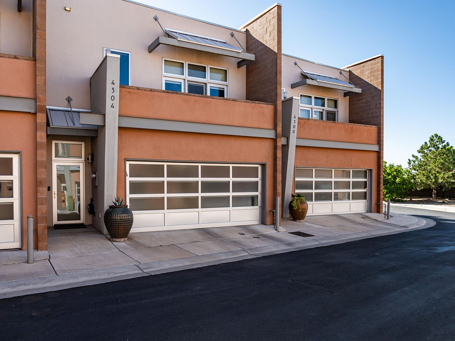 4304 Prairie Loft Way NE exterior facade, contemporary southwestern townhome