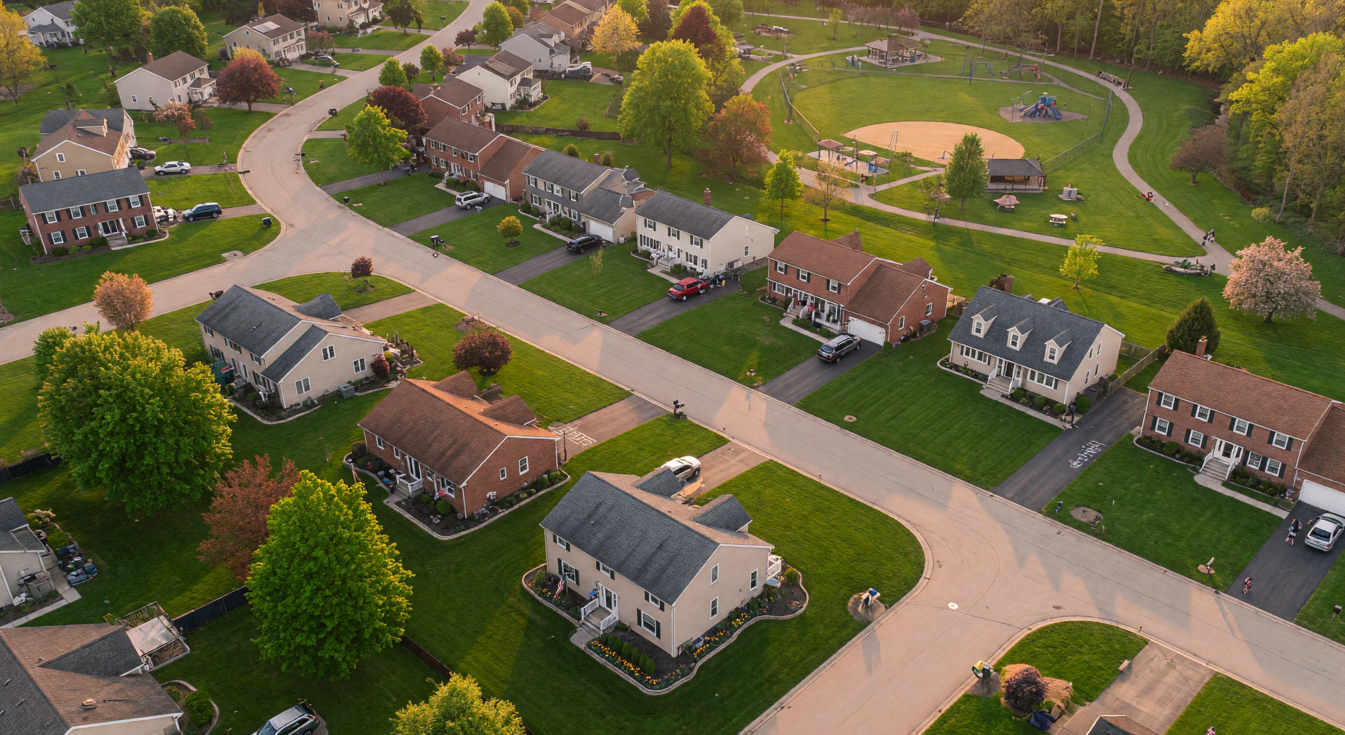 High-angle aerial photograph tracking a beautiful residential community setting