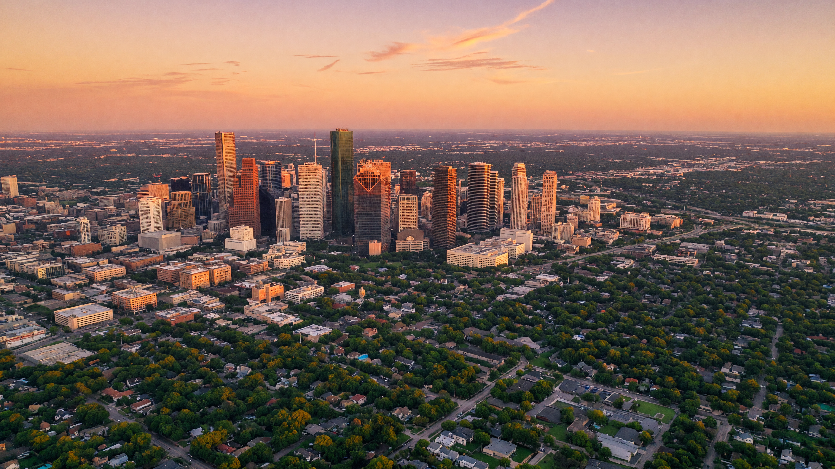 Houston skyline at golden hour seen from the west side of the metro