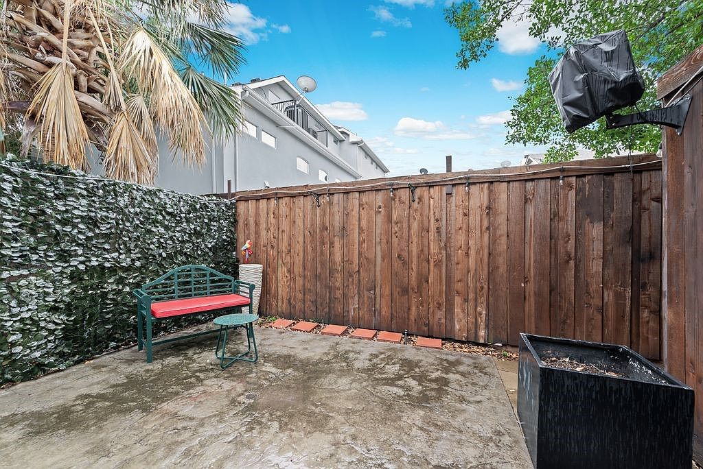 Private outdoor patio with timber privacy fence