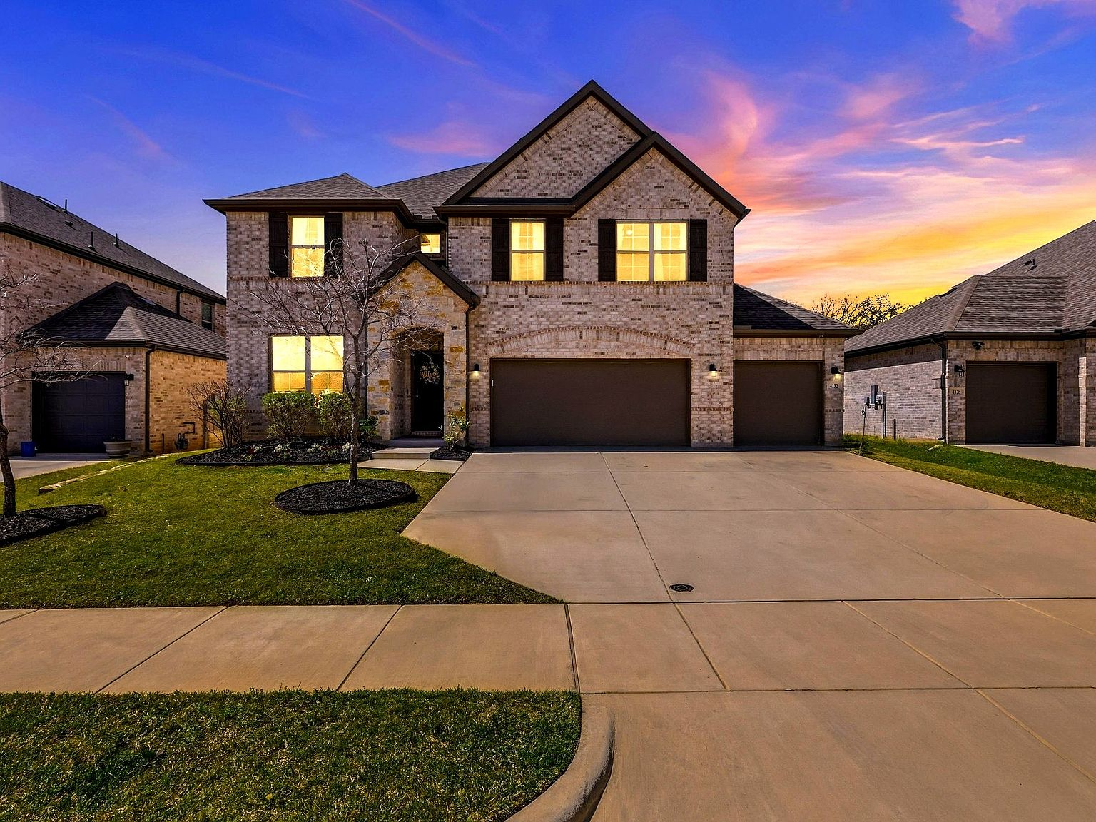 4132 Kyles Landing Dr front exterior at twilight
