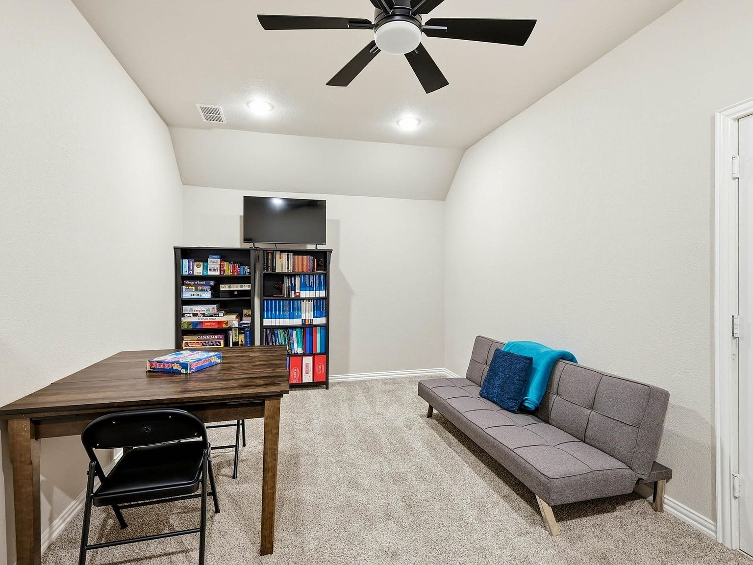 Upstairs bonus room currently used as game room and office