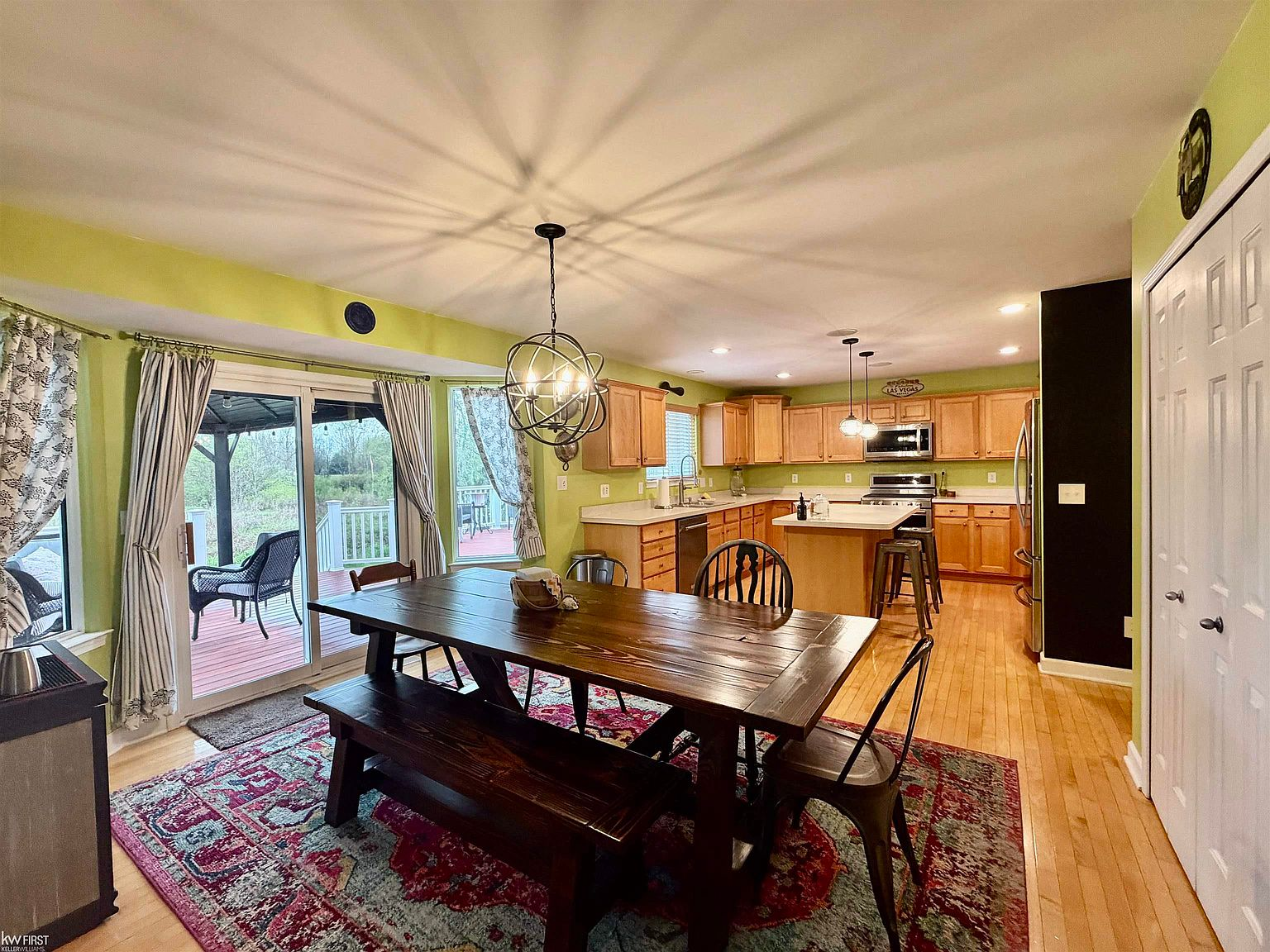 Open-concept dining room looking toward the kitchen