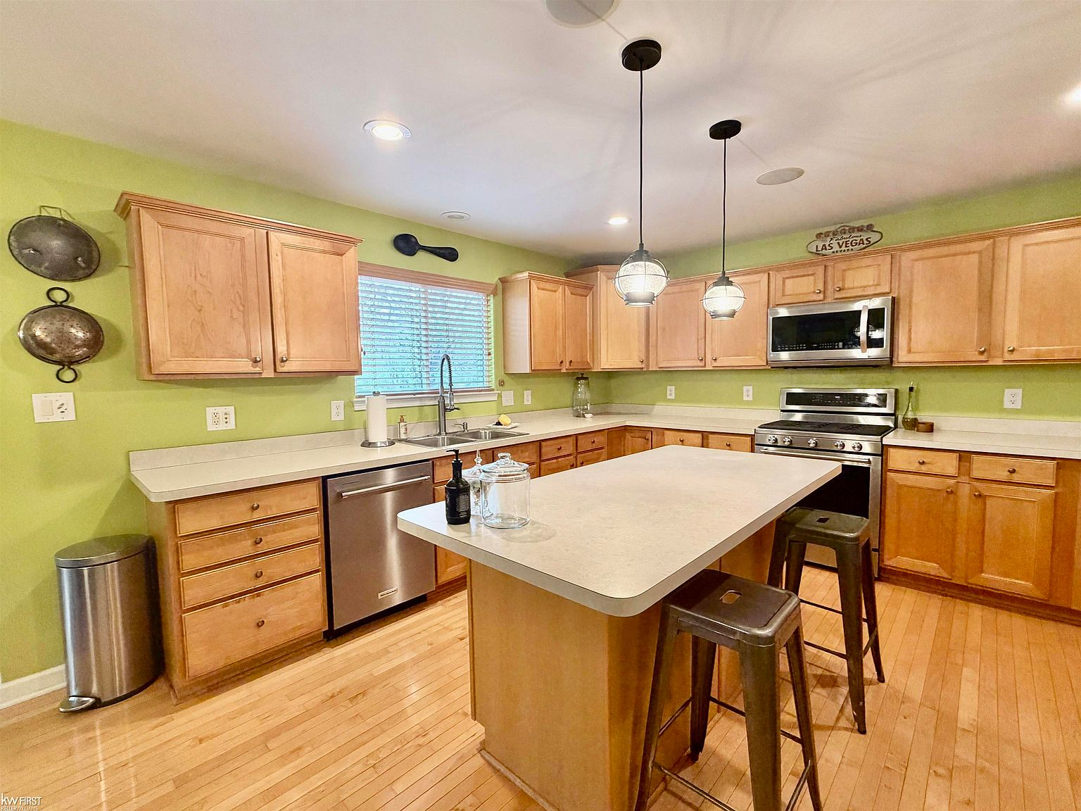 Kitchen with large island and oak cabinetry