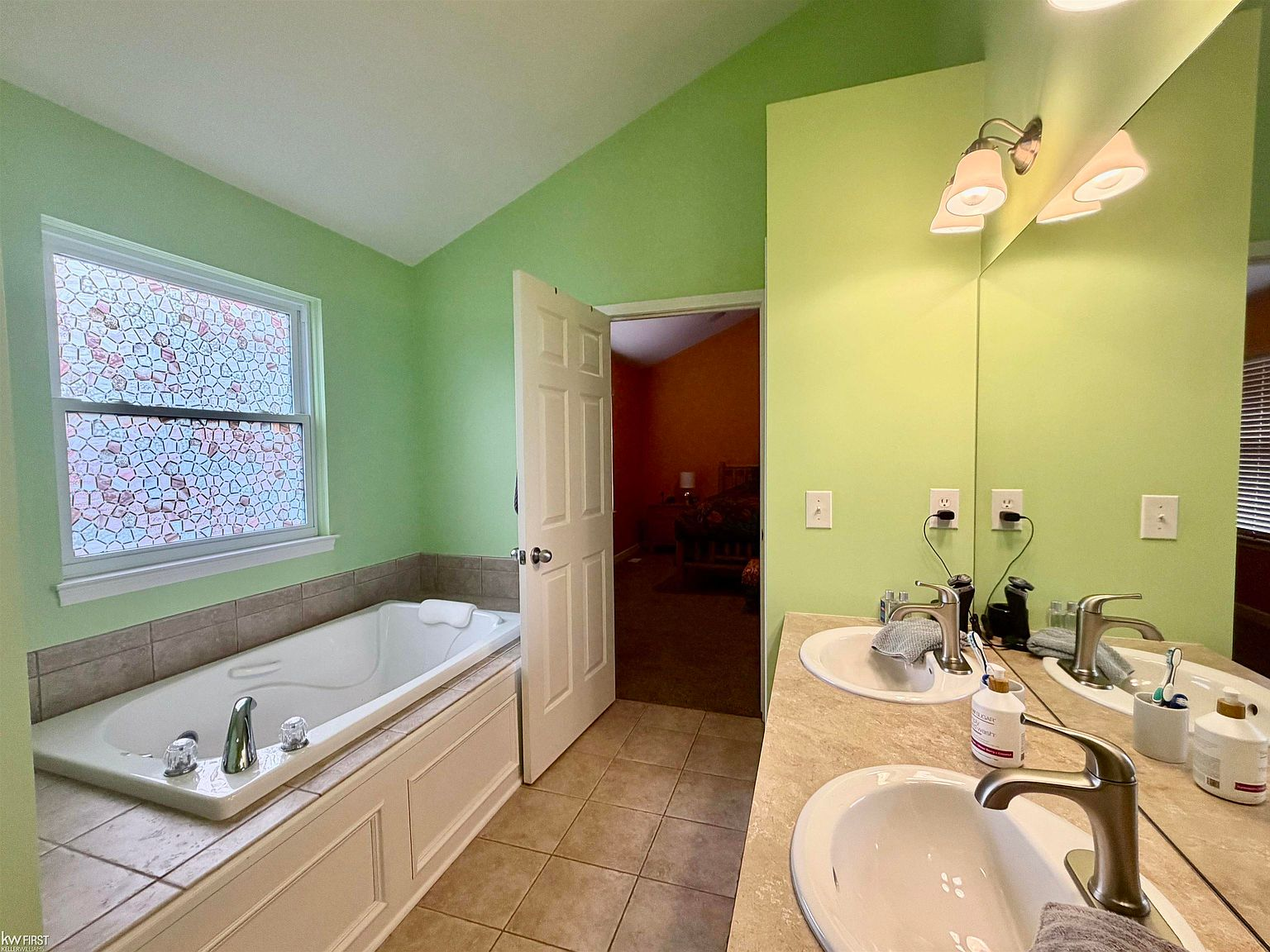 Primary bathroom with soaking tub and double vanity