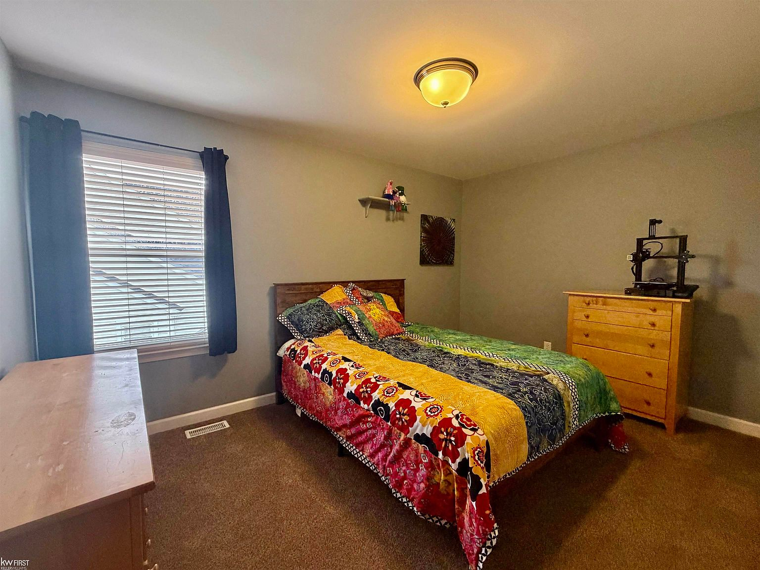 Carpeted secondary bedroom