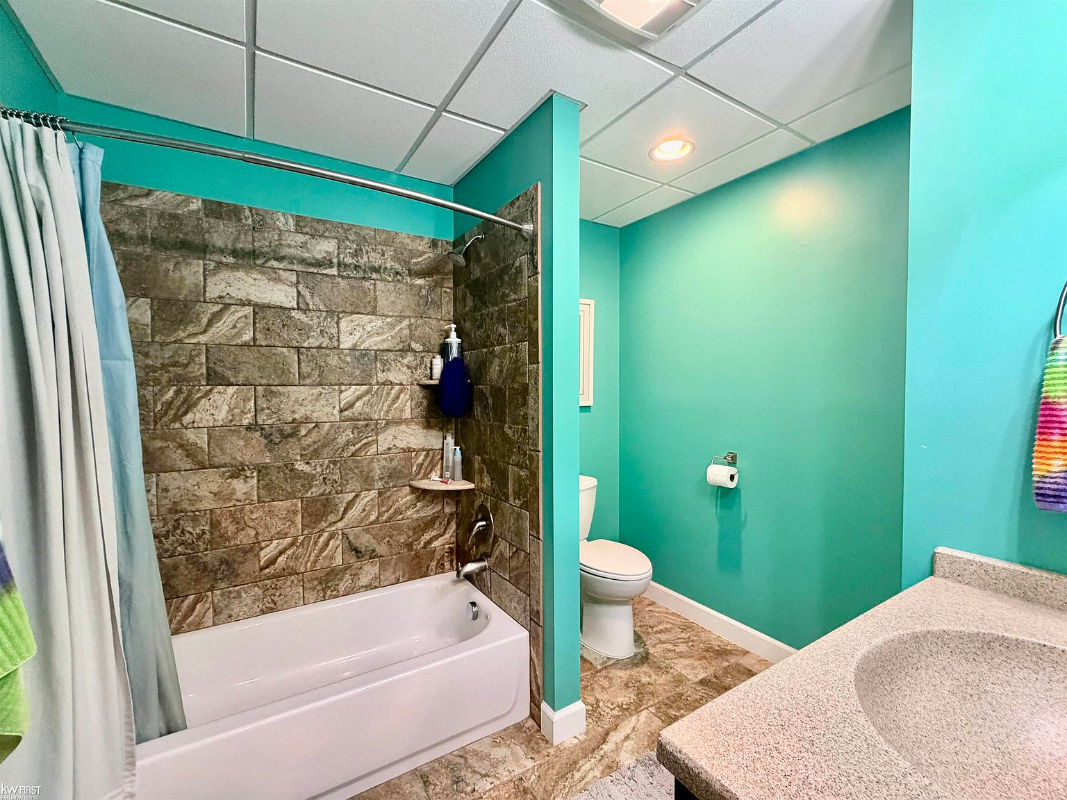 Basement bathroom with bathtub