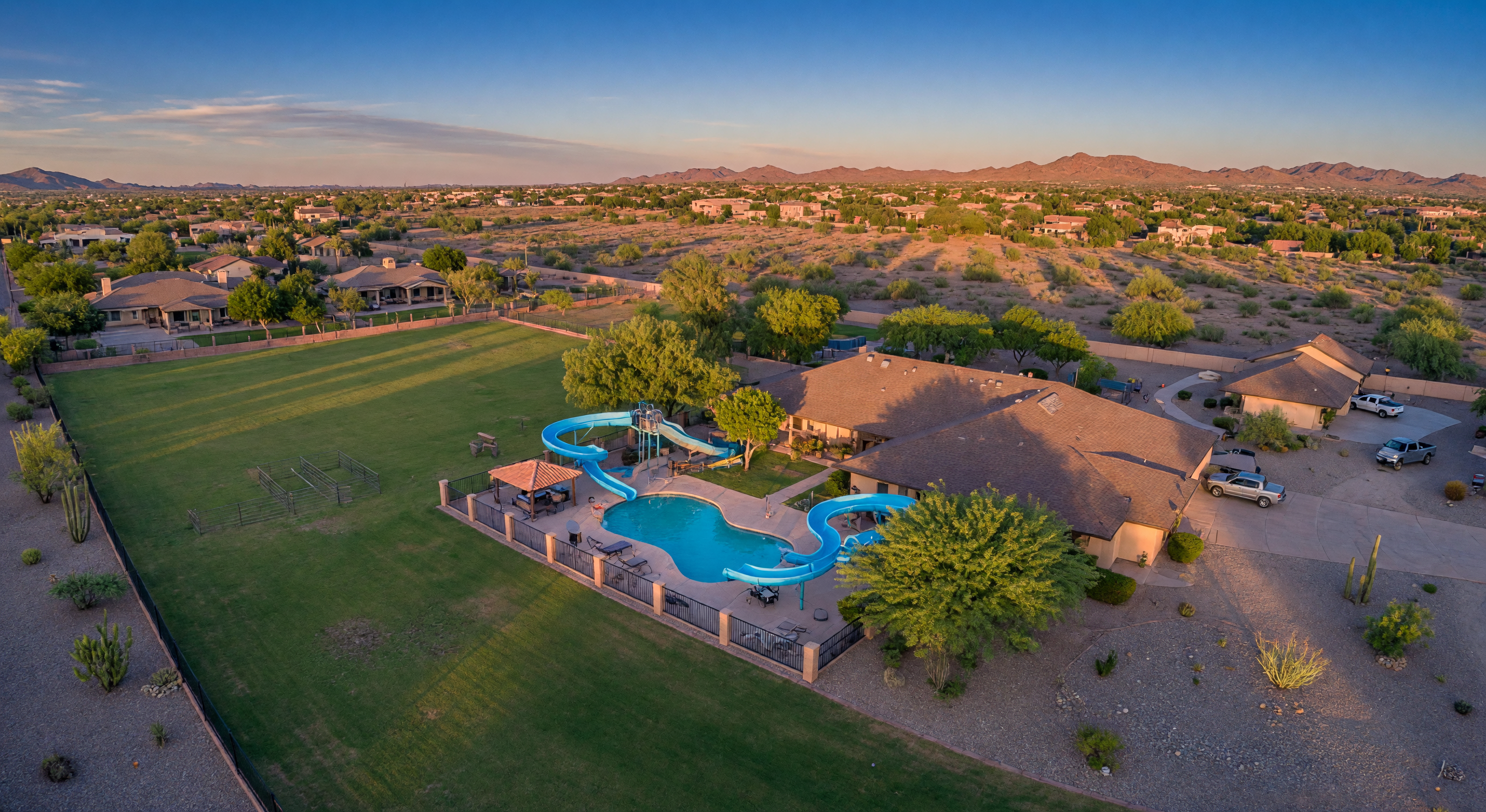 Tolleson, Arizona suburban street at golden hour with desert landscaping