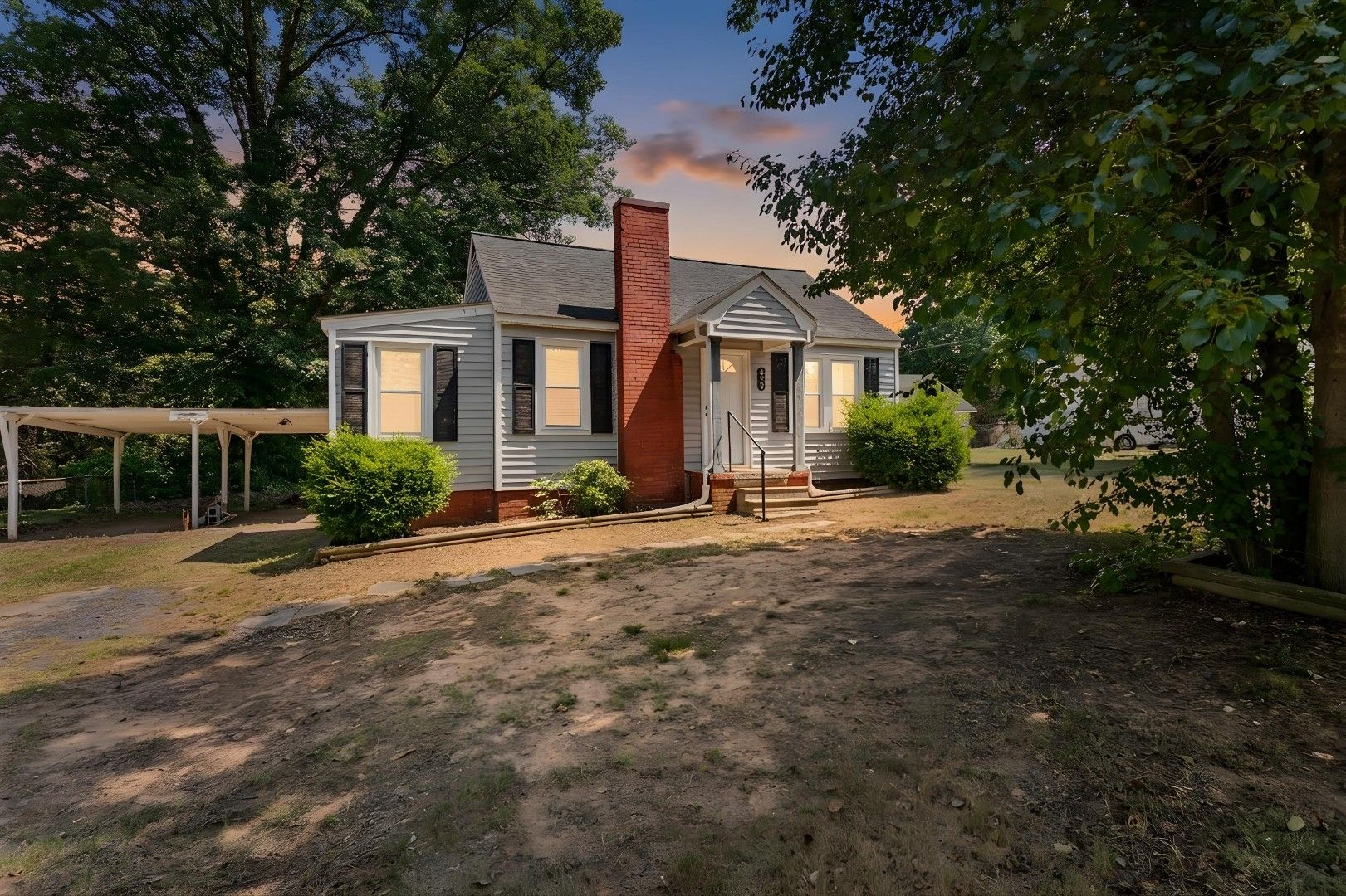 238 Underwood St cottage front facade at sunset