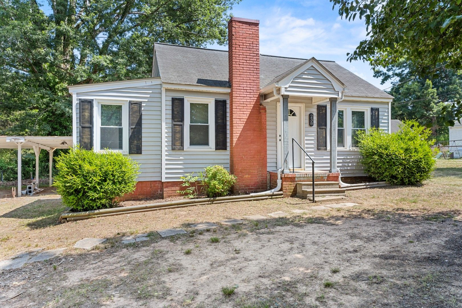 Clean daylight front facade of the single-story home at 238 Underwood St