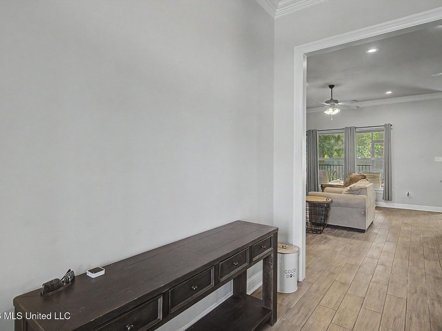 Foyer layout leading into an open living room