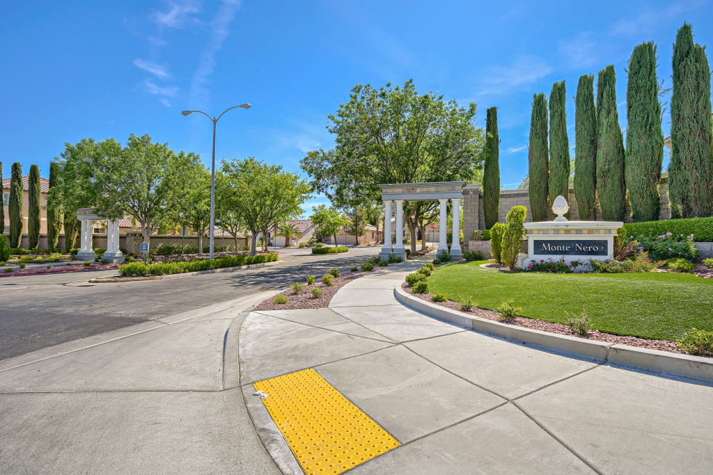 Grand Tuscan-style arched portal welcoming you to the Seven Hills community