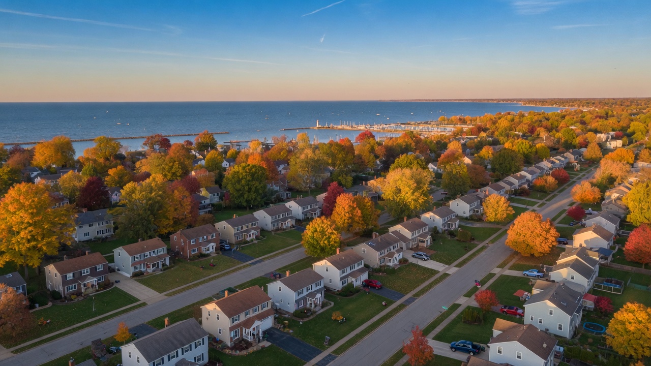 Aerial view of Mentor Ohio neighborhood with Lake Erie in the background during autumn
