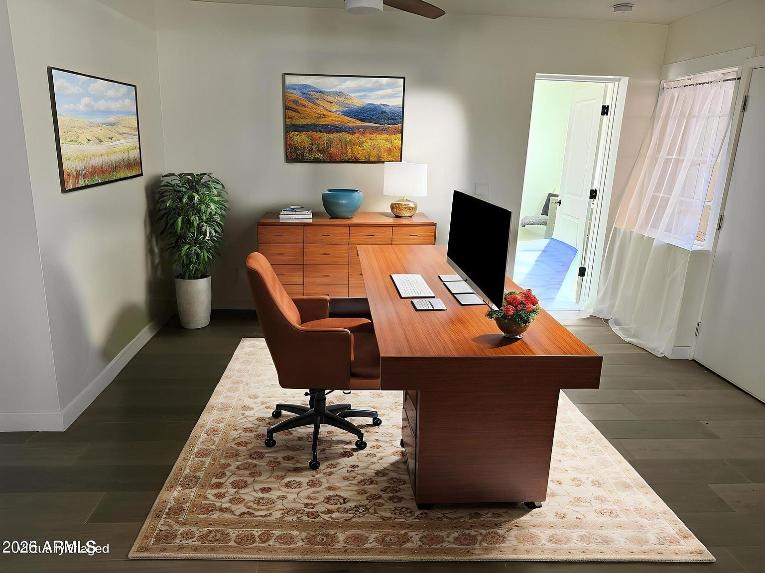 Tranquil den or home office workspace with sheer window curtains