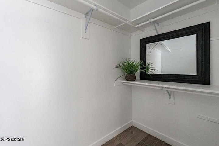 Sleek painted walk-in closet shelving
